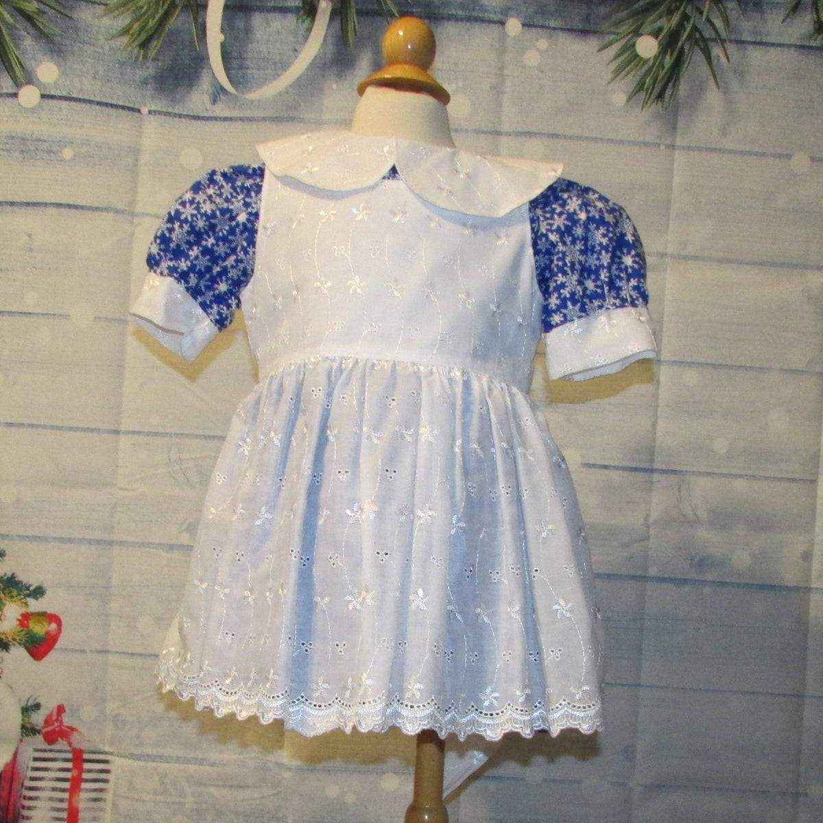 2 Pc. Blue Snowflake Christmas Dress with White Eyelet Overlay