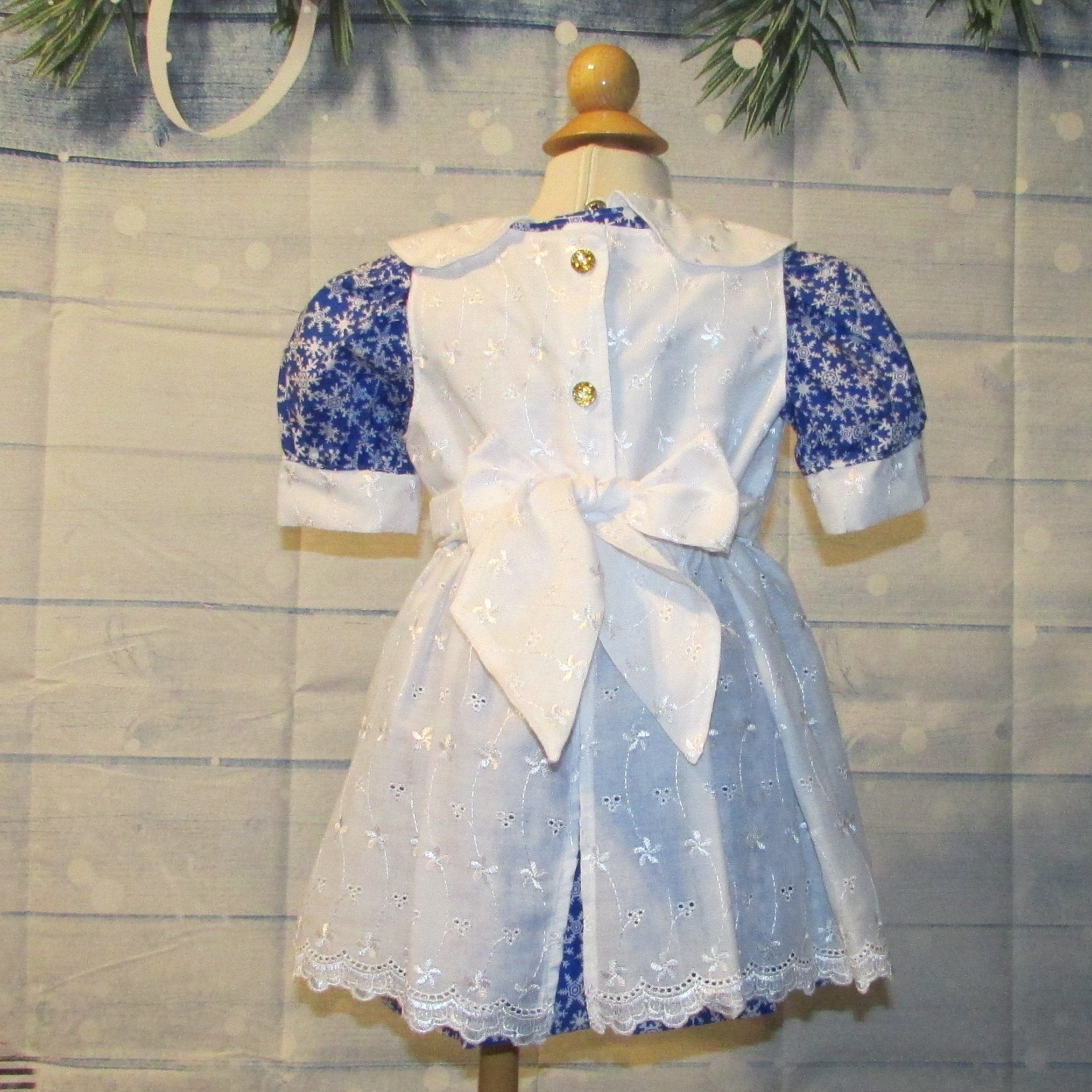 2 Pc. Blue Snowflake Christmas Dress with White Eyelet Overlay