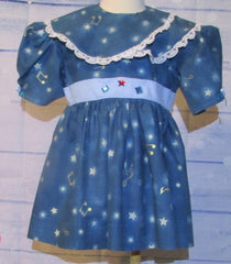 Christmas Blue Dress with Stars and Musical notes Light Blue Sash